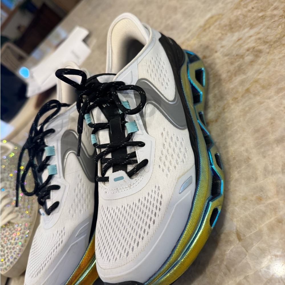 Skechers White and Black Sneakers with Gold Accents worn once
